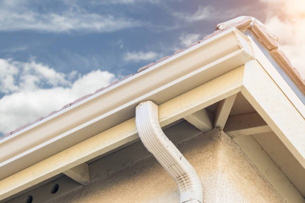 House with New Seamless Aluminum Rain Gutters.House with New Seamless Aluminum Rain Gutters.